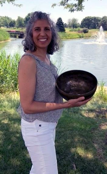 Sonia holding a bowl